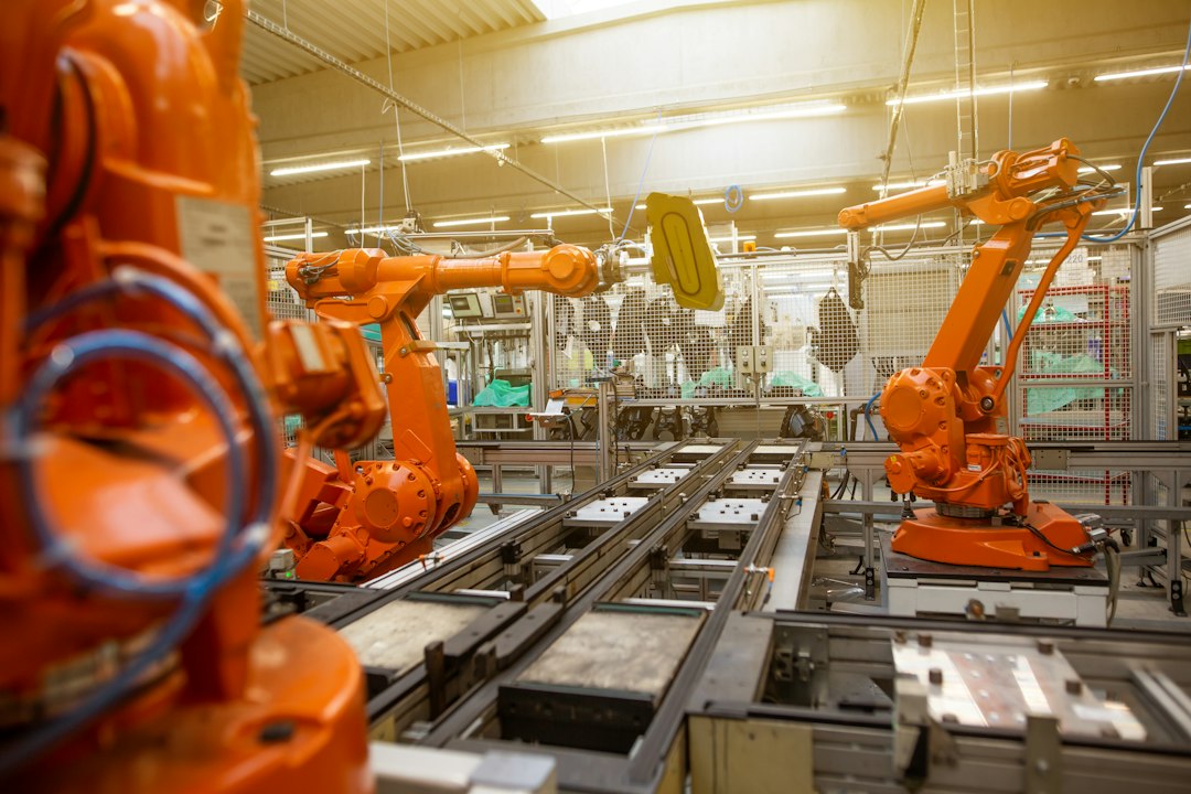 Automated robots on an industrial factory assembly line (illustrative image)