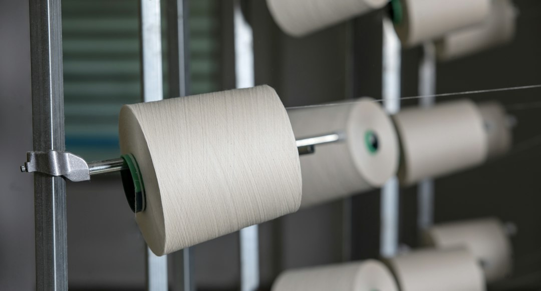 Circular knitting machines in a textile mill, the kind of capacity behind CAFTA-DR yarn-forward apparel