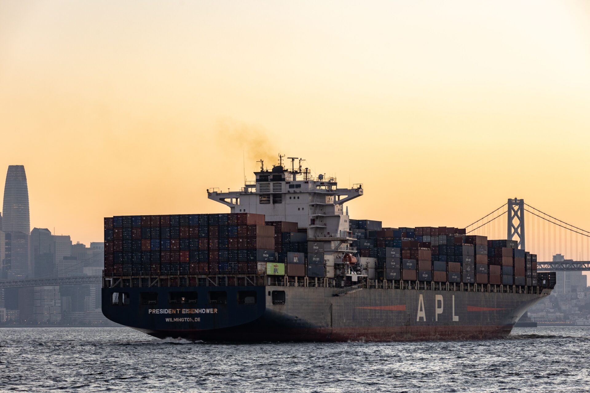 Container ship in a harbor symbolizing Latin American transshipment hubs and global trade flows.