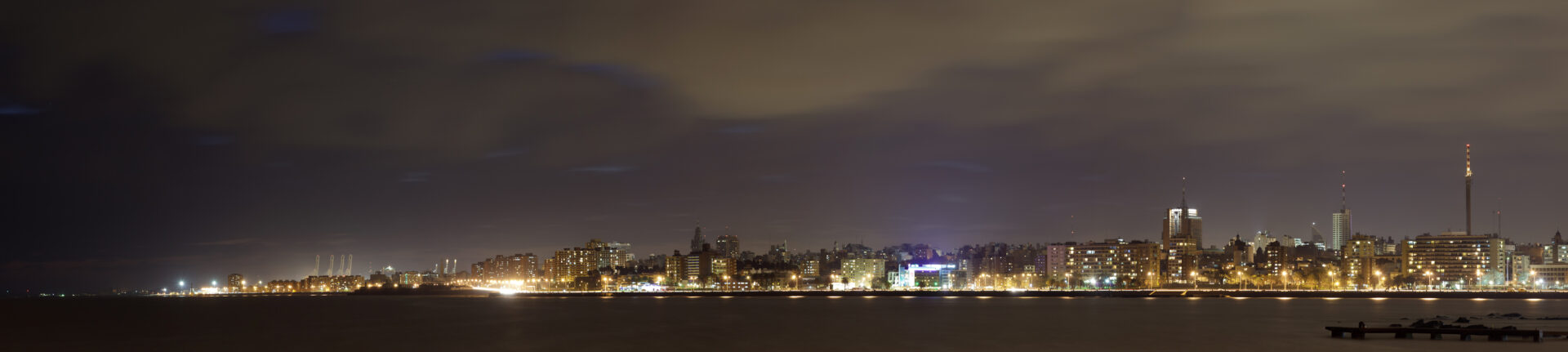Night panorama of Montevideo skyline along the Rambla in Montevideo, Uruguay